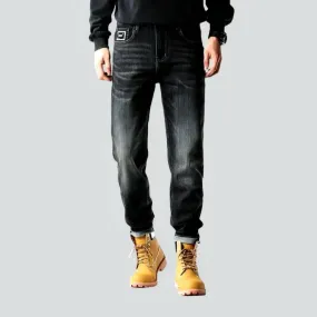 Black men's tapered jeans