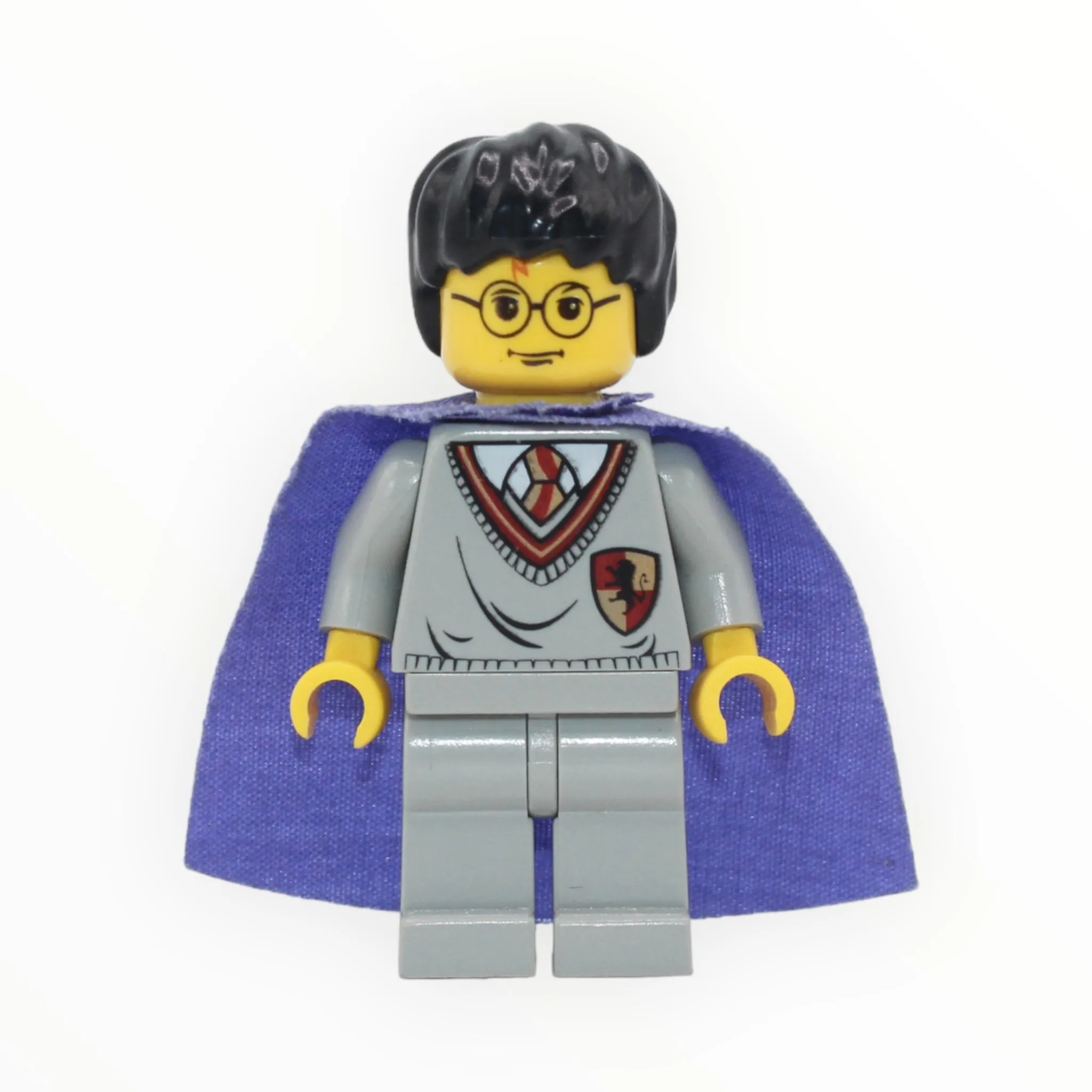 Harry Potter (Gryffindor sweater, violet cape, yellow skin)