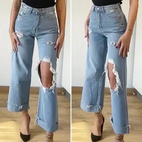 Jeans con maxi spacco e risvolto