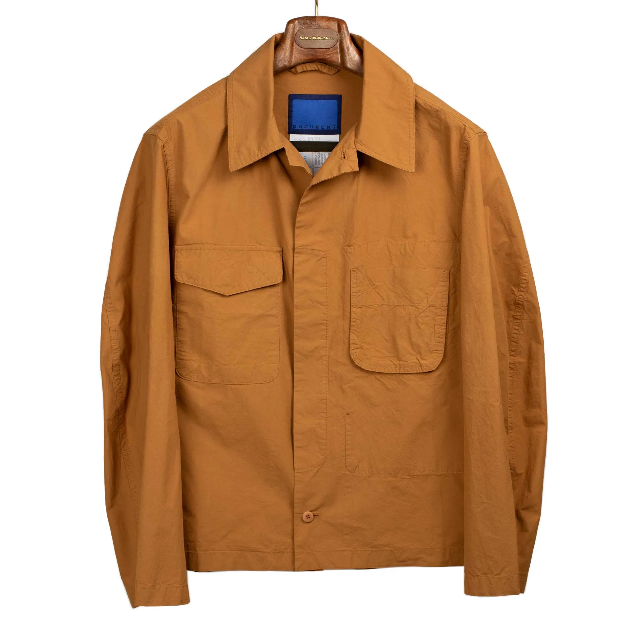 Patch pocket jacket in lightweight burnt orange typewriter cotton